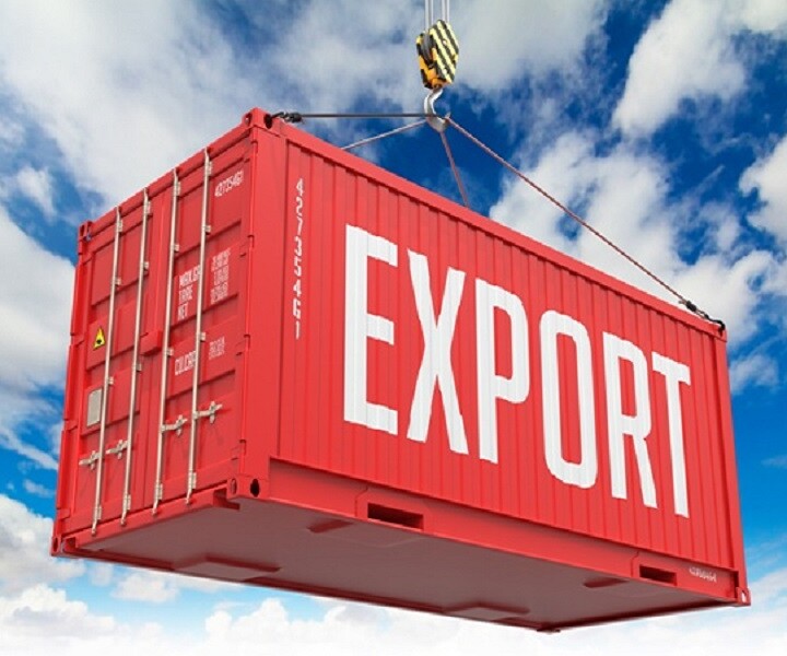 Export - Red Cargo Container hoisted with hook on Blue Sky Background.